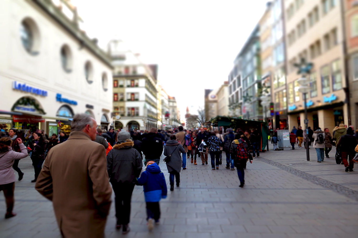 people walking on shopping street