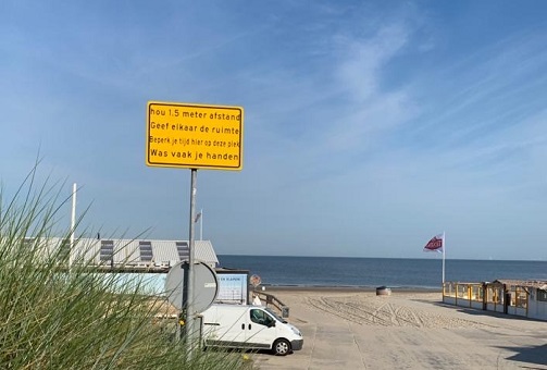 waarschuwingsbord bij strandopgang